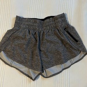 Lululemon Track that high rise lined short. Size 4. Grey color.